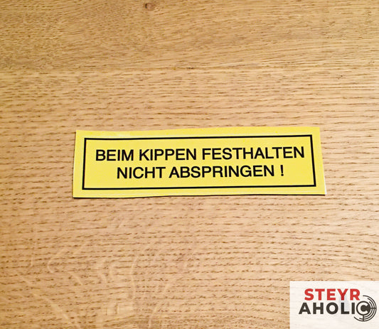 Aufkleber "Beim Kippen festhalten"